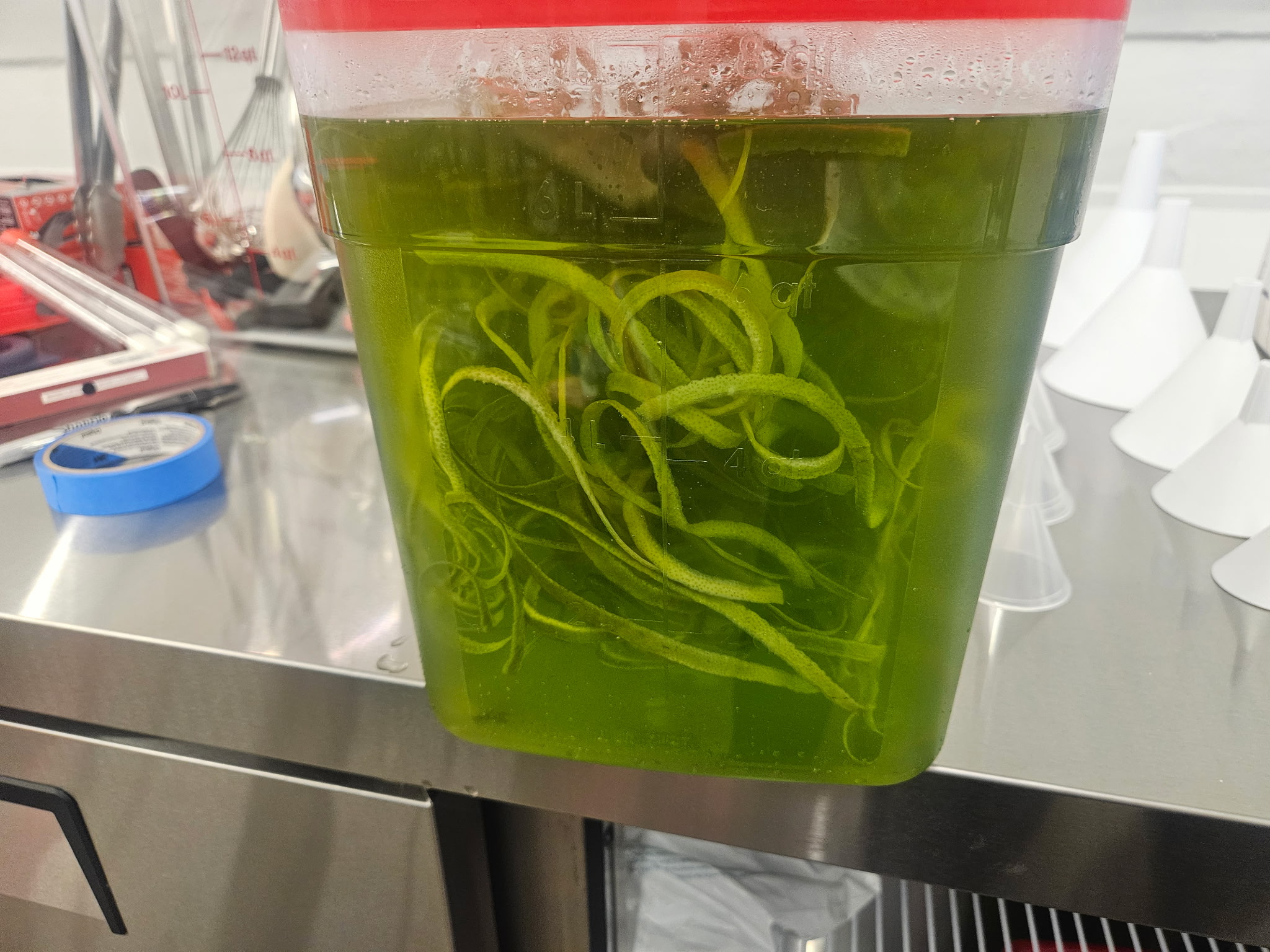 Lime peels in water for Limettacello - Goldencello